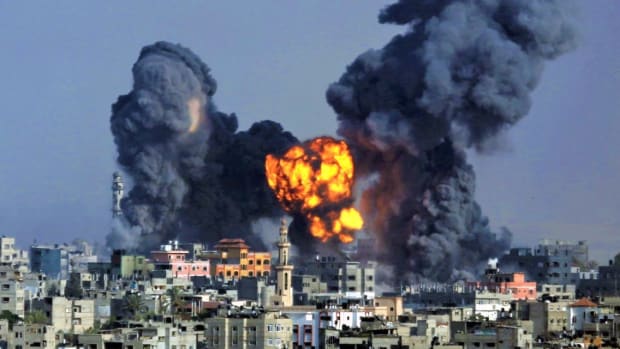 042721-In-this-July-22-2014-file-photo-smoke-and-fire-from-a-devastating-Israeli-airstrike-rise-over-Gaza-City-during-the-holy-month-of-Ramadan.-AP-Photo-Hatem-Moussa-1280x640