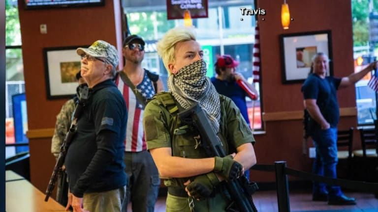 Anti-lockdown protesters carry weapons into North Carolina sandwich shop